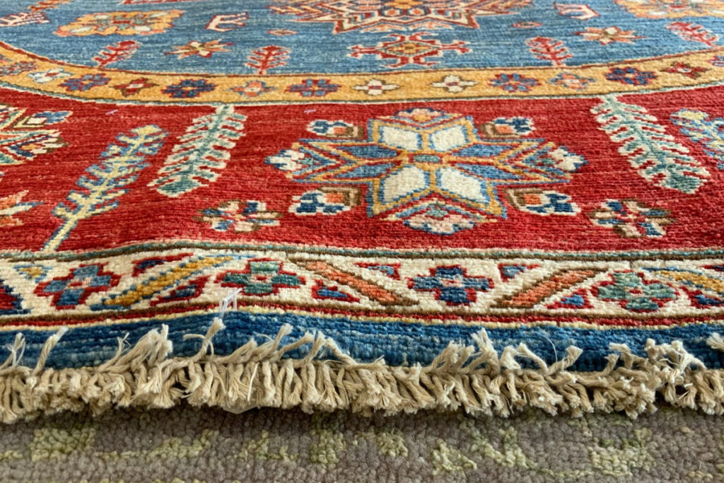 David Tiftickjian and Sons has oval rugs and Kazak rugs for any dining room.