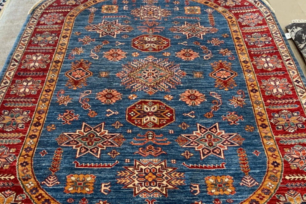 David Tiftickjian and Sons has oval rugs and Kazak rugs for any dining room.