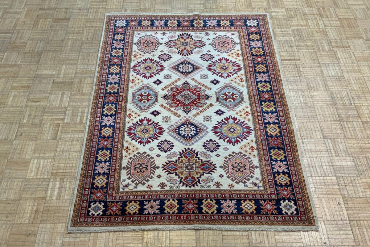 Warm up cool decor with a beautiful Kazak Rug area rug from David Tiftickjian and Sons in Buffalo, NY.
