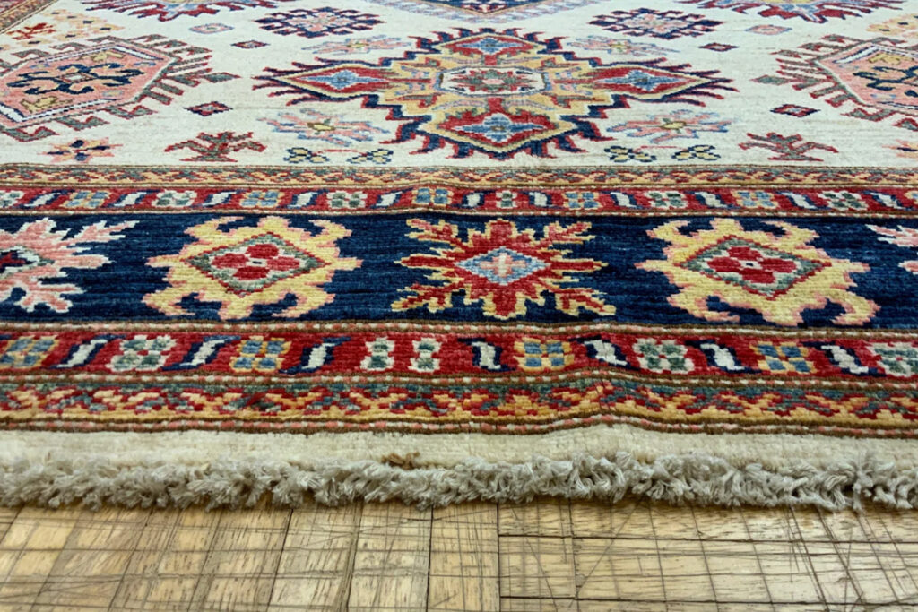 Warm up cool decor with a beautiful Kazak Rug area rug from David Tiftickjian and Sons in Buffalo, NY.