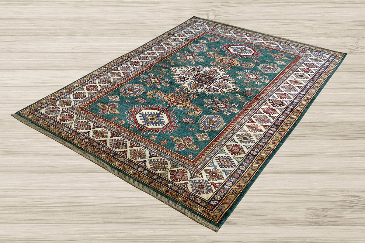 Add this beautiful green Kazak area rug to your living room with David Tiftickjian & Sons.