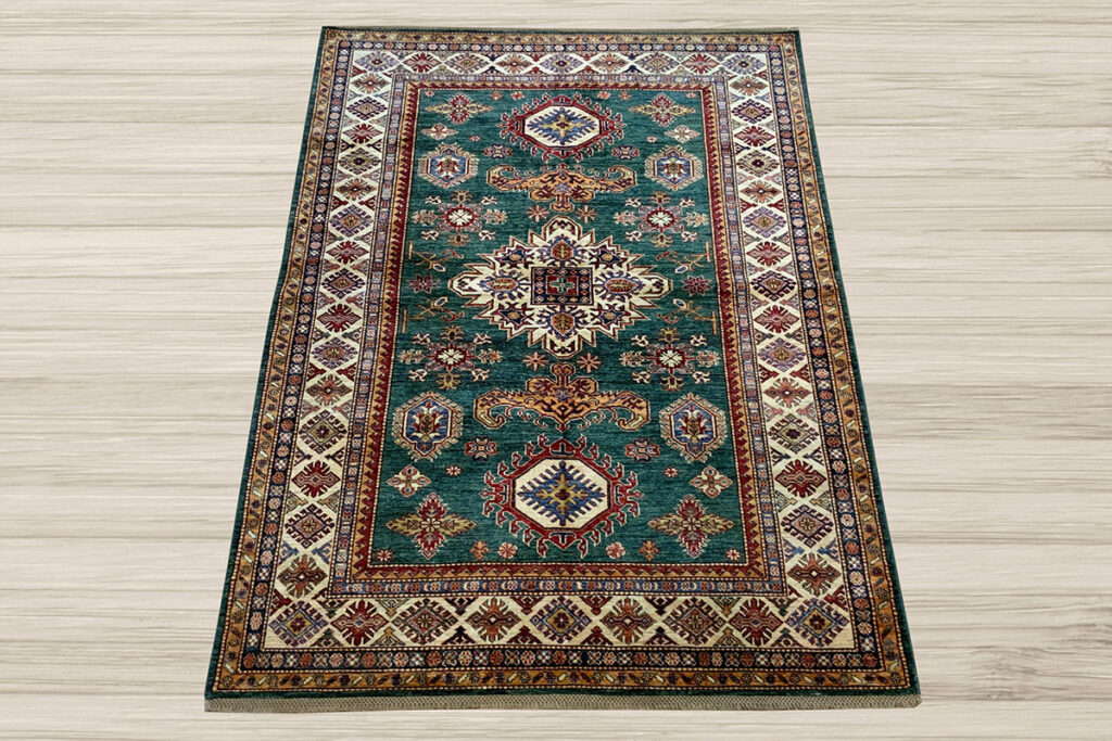 Add this beautiful green Kazak area rug to your living room with David Tiftickjian & Sons.