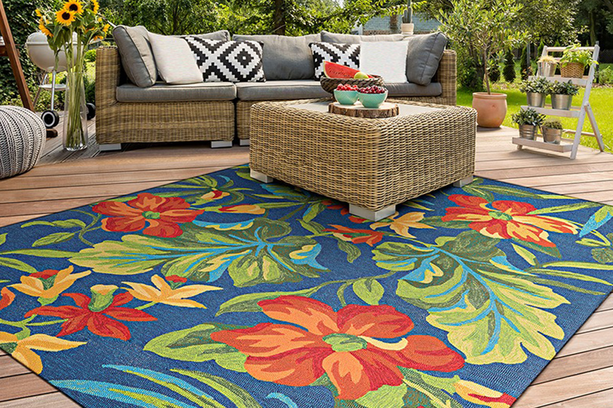 Create a tropical oasis in your own backyard with an indoor/outdoor rug from David Tiftickjian & Sons and Couristan.