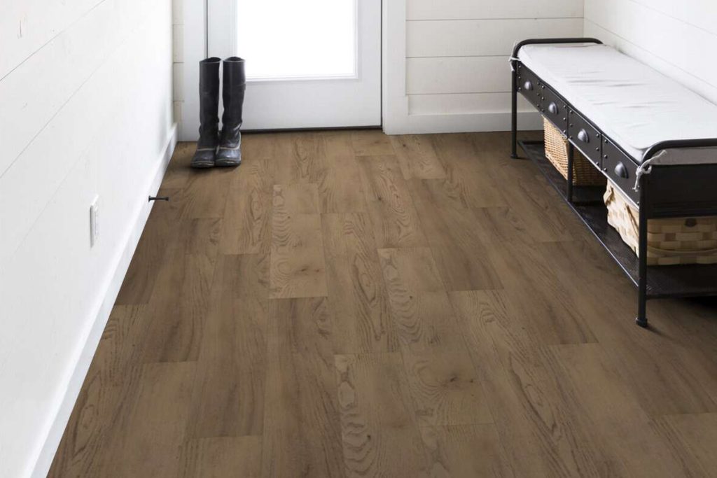 Luxury vinyl flooring is a durable alternative that's also resilient and easy to clean; perfect for any mudroom!