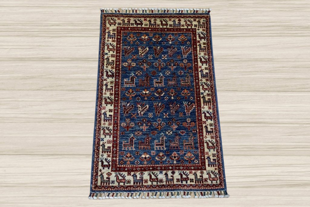 Let your area rug tell a story with a stunning Pictoral Kazak from David Tiftickjian & Sons.