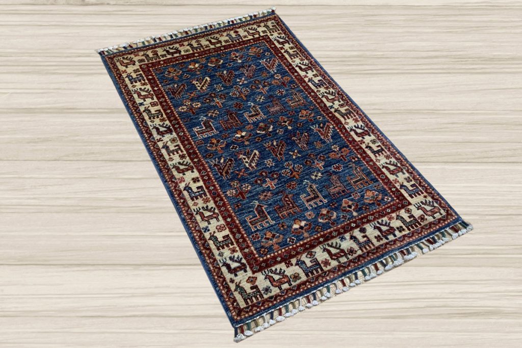 Let your area rug tell a story with a stunning Pictoral Kazak from David Tiftickjian & Sons.