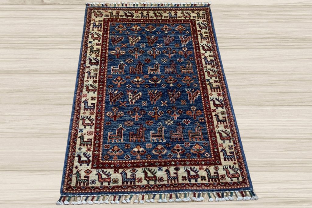 Let your area rug tell a story with a stunning Pictoral Kazak from David Tiftickjian & Sons.