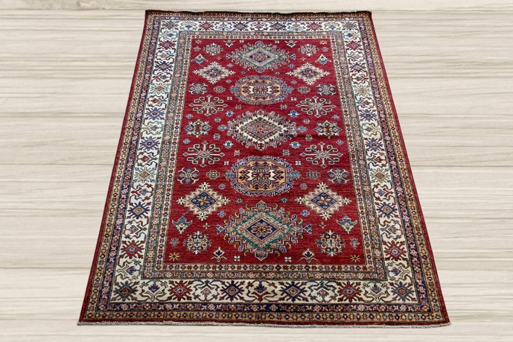 Love your home decor again and go red with a stunning Kazak Area Rug from David Tiftickjian & Sons.