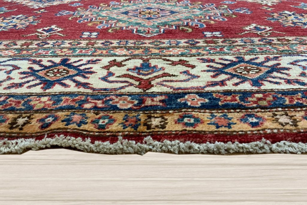 Love your home decor again and go red with a stunning Kazak Area Rug from David Tiftickjian & Sons.
