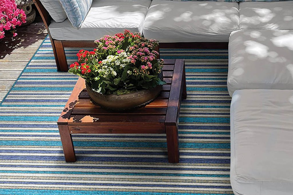 "Heat up" your decor with a beautiful indoor outdoor area rug from David Tiftickjian and Couristan. 