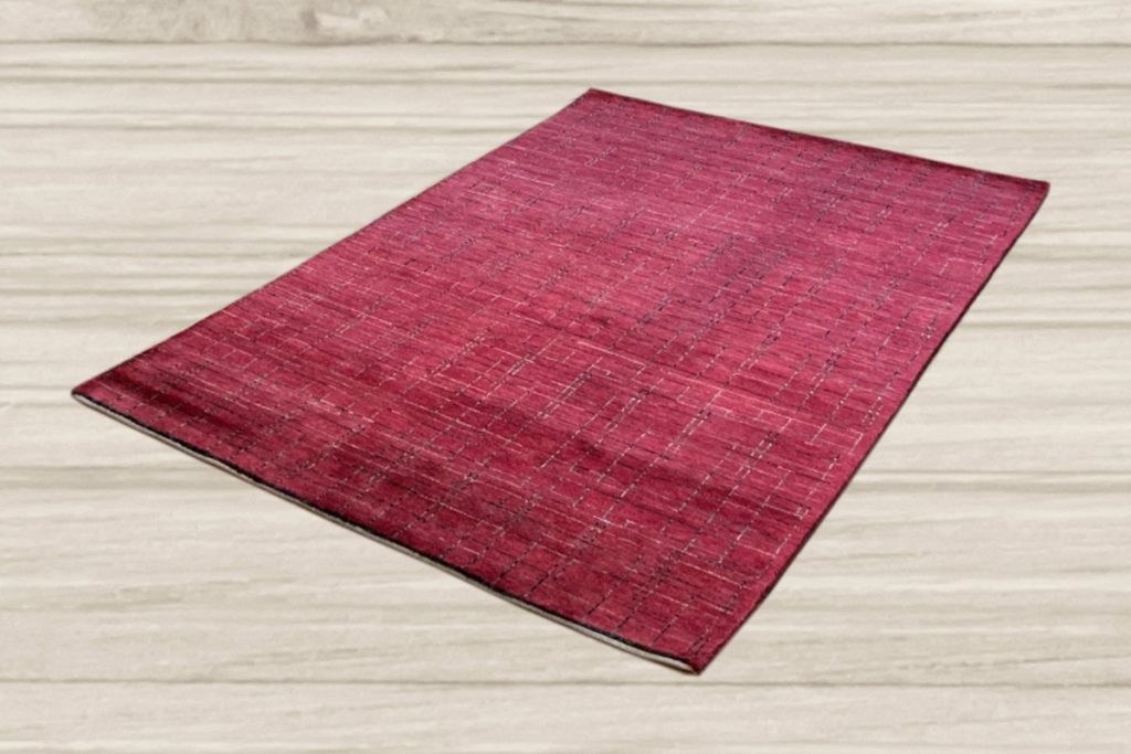 If you enjoy adding patriotic decor to your home, incorporate this Modern Panal red rug that celebrates red, white, and blue. Available at David Tiftickjian & Sons.