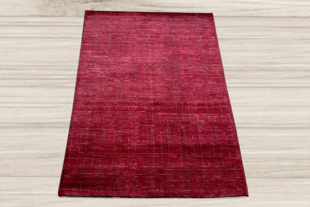 If you enjoy adding patriotic decor to your home, incorporate this Modern Panal red rug that celebrates red, white, and blue. Available at David Tiftickjian & Sons.