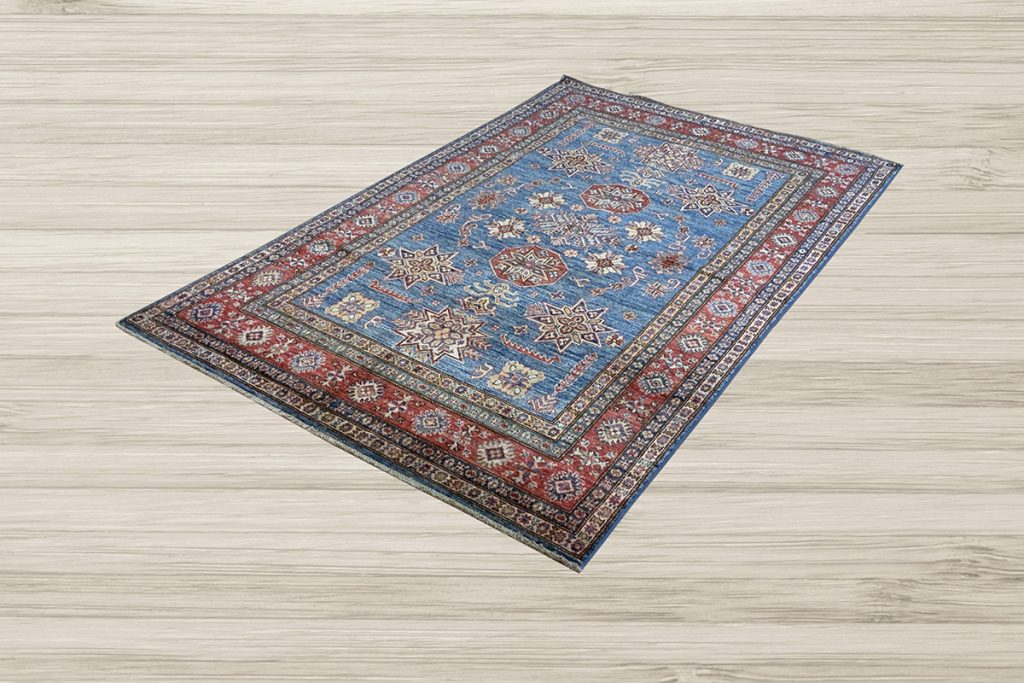 Bring shades of blue into your decor with a Kazak rug from David Tiftickjian and Sons.