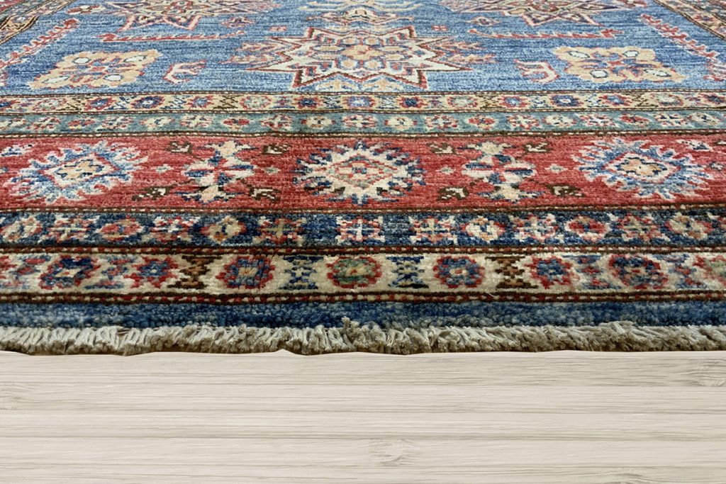 Bring shades of blue into your decor with a Kazak rug from David Tiftickjian and Sons.