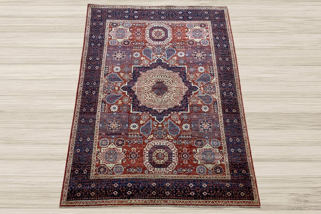 With its large central medallion and intricate geometric motifs, this Mamluk rug is the perfect backdrop for creating memories.