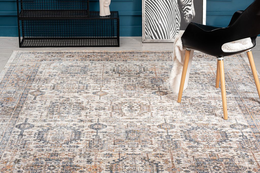 Drawing influence from traditional and tribal designs using soft earth tones, our machine made Oushak rug, Tift Tuesday pick "Oushak SM-787," will elevate any interior! 