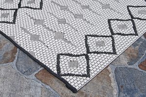 Indoor/Outdoor rugs like Tift Tuesday pick "Pattern-9001" by Couristan are easy to clean, mold and mildew resistant, and beautiful to behold!