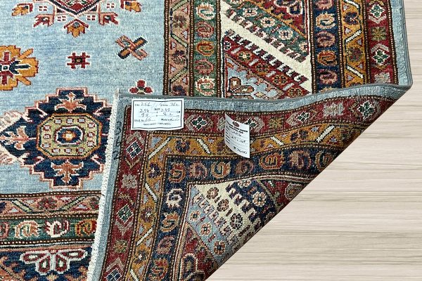Protect your hardwood flooring from accidental wear-and-tear, increased foot traffic, spills, and stains with a stunning one-of-a-kind Super Kazak rug.