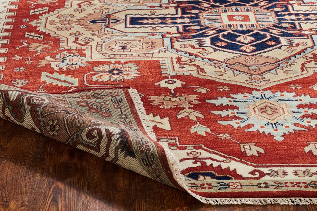 This made to order, hand knotted Tabriz rug uses premium wool yarns in a variety of colorways to create a rich, dynamic floor decor. 