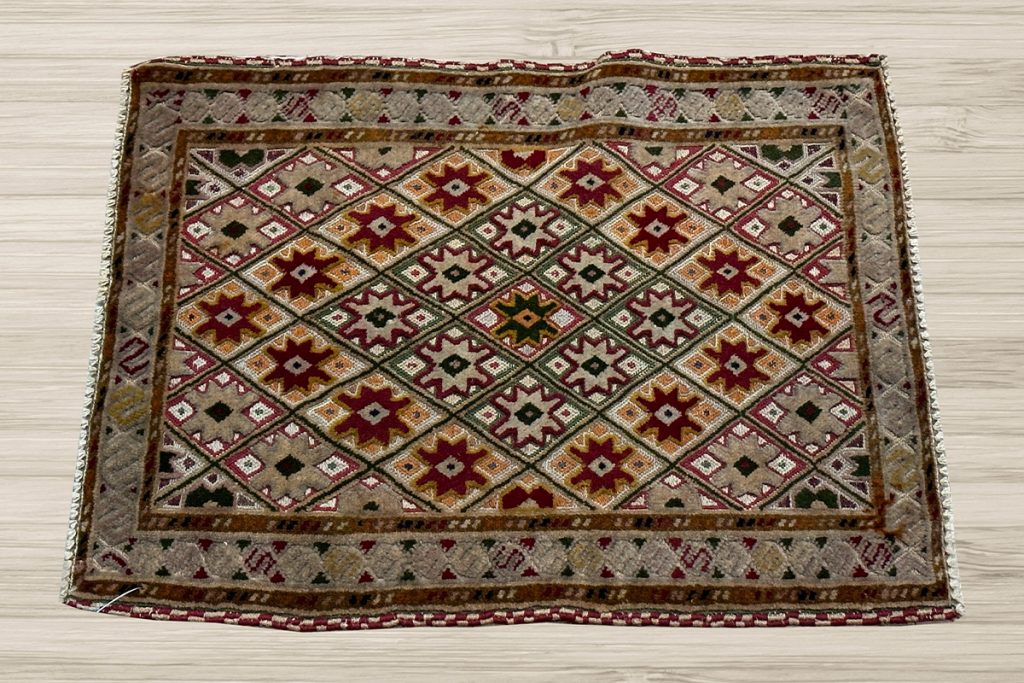 Explore these newly acquired, one-of-a-kind Afghan area rugs that are UNDER $200 and UNDER 3' LONG from David Tiftickjian and Sons.