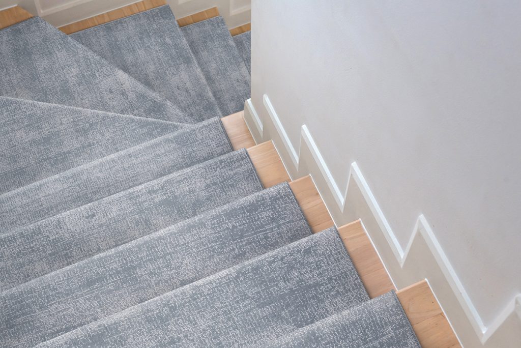 As you baby proof your house, think long-term and think about installing a stair runner to create a safer staircase. 