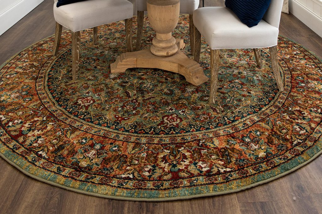 Instead of choosing a traditionally shaped rug, match shapes and opt for a round area rug from David Tiftickjian And Sons!