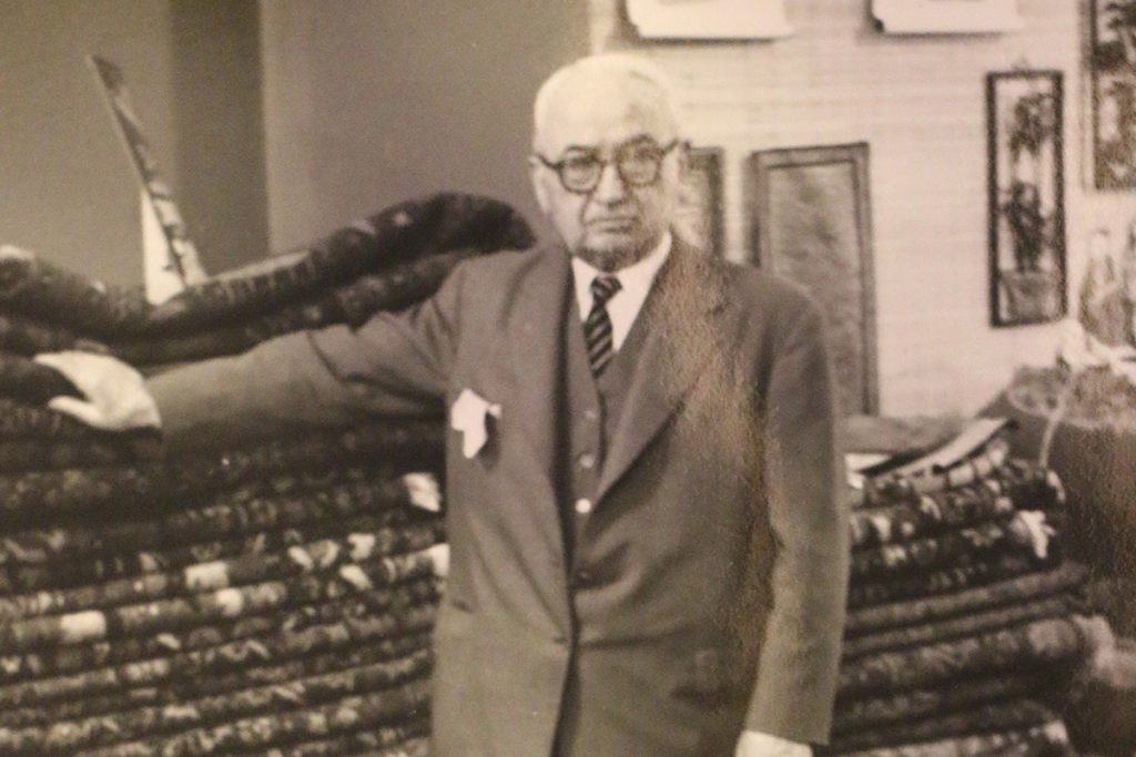 An old black and photography of David Tiftickjian Senior in celebration of the 133rd Anniversary Sale.