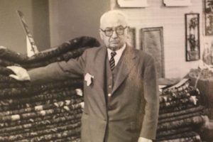 An old black and photography of Dickran Tiftickjian in celebration of the 133rd Anniversary Sale.