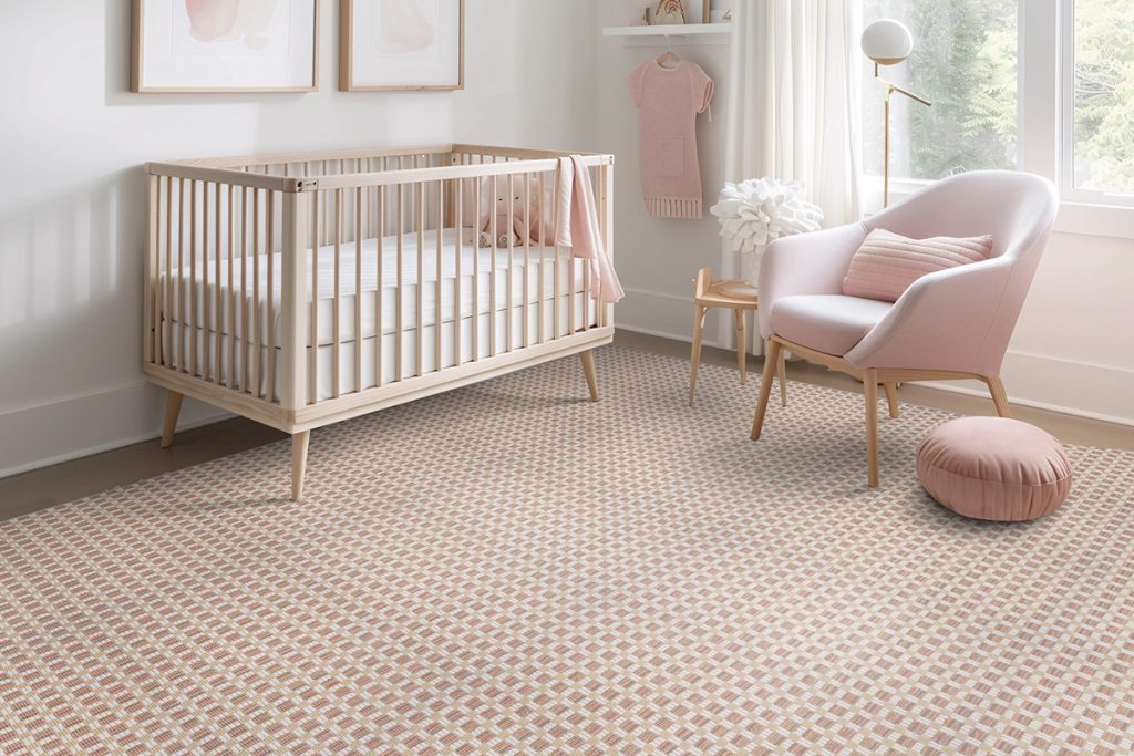 A pink-themed nursery with pink carpet from Stanton as an example of the ideal floor choice for nurseries.