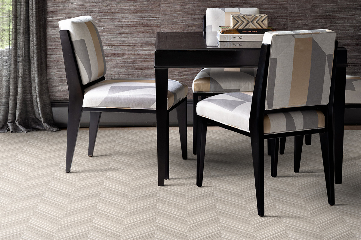 Light brown herringbone patterned wool carpet from Kravet x Stanton - available at David Tiftickjian & Sons.