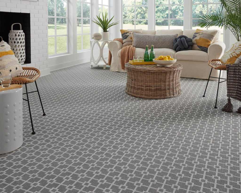 A living room shot with a gray carpet from the 1866 by Masland collection for David Tiftickjian And Son's Masland Carpet Sale!