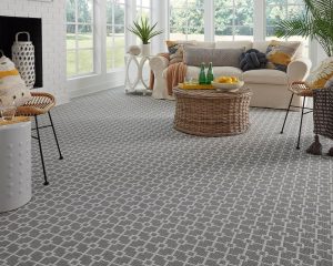 A living room shot with a gray carpet from the 1866 by Masland collection for David Tiftickjian And Son's Masland Carpet Sale!