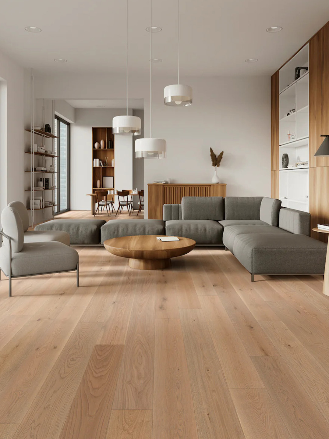 Light warm colored hardwood floor with gray furniture and a living room scene.