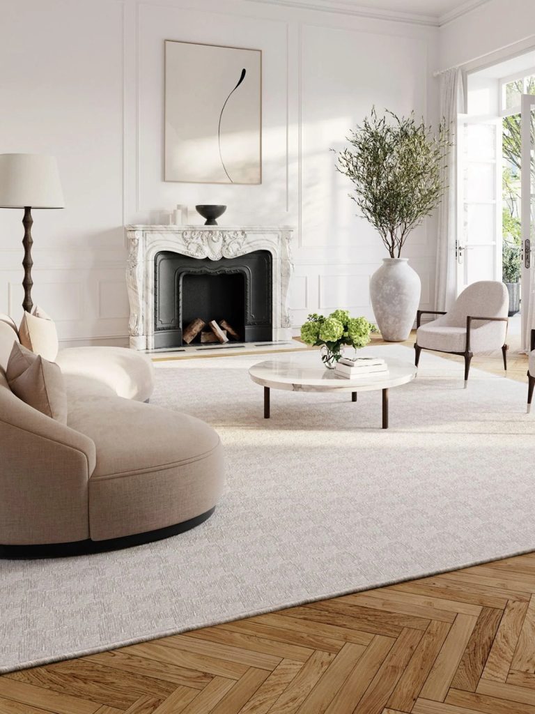 A subtle white patterned residential carpet in a neutral living room setting.