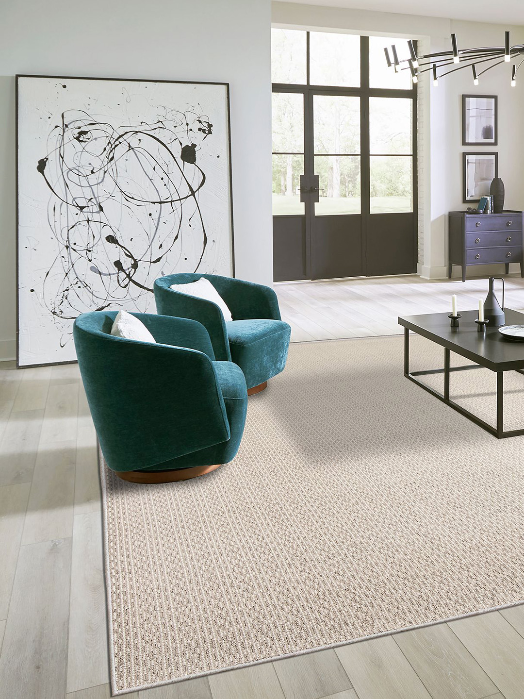 A light brown patterned residential carpet beneath teal chairs in a living room setting.