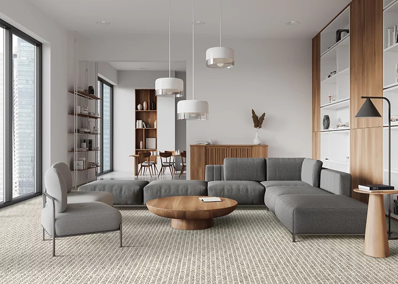 A light colored carpet in a bright living room setting to advertise our Couristan rug and carpet sale.