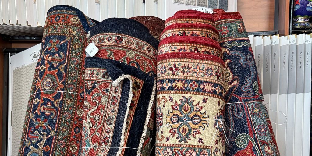 Rolled up rugs to tease the new oriental rugs in our Fall Collection.