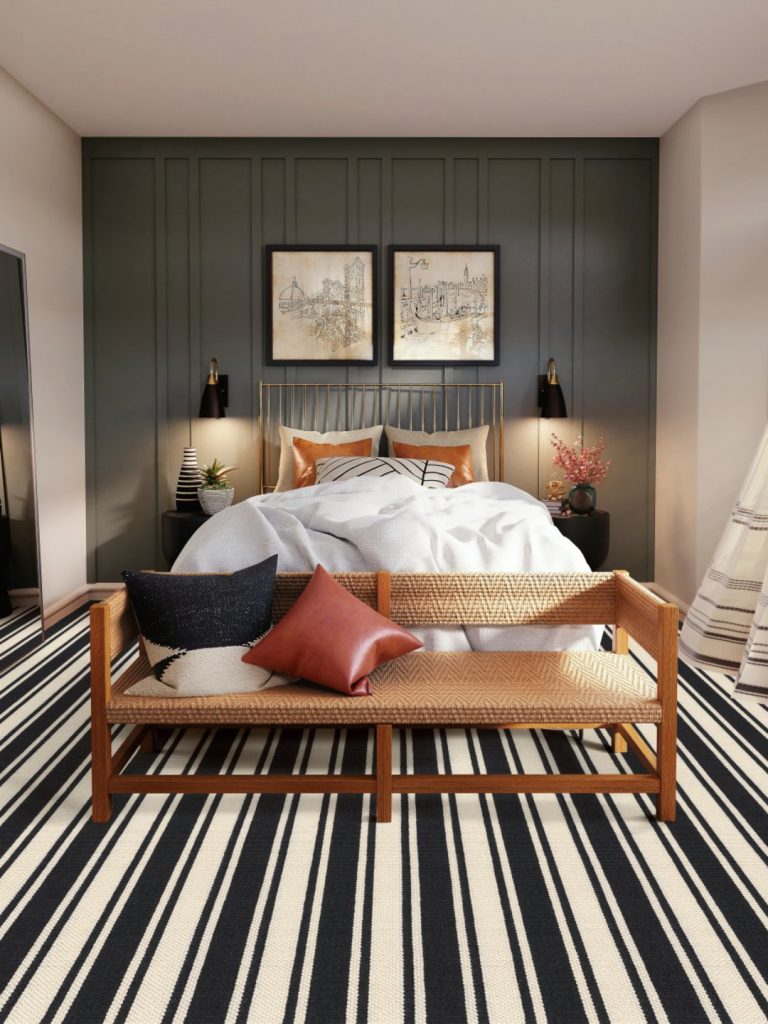 A navy and white striped carpet by Masland in a bedroom setting 