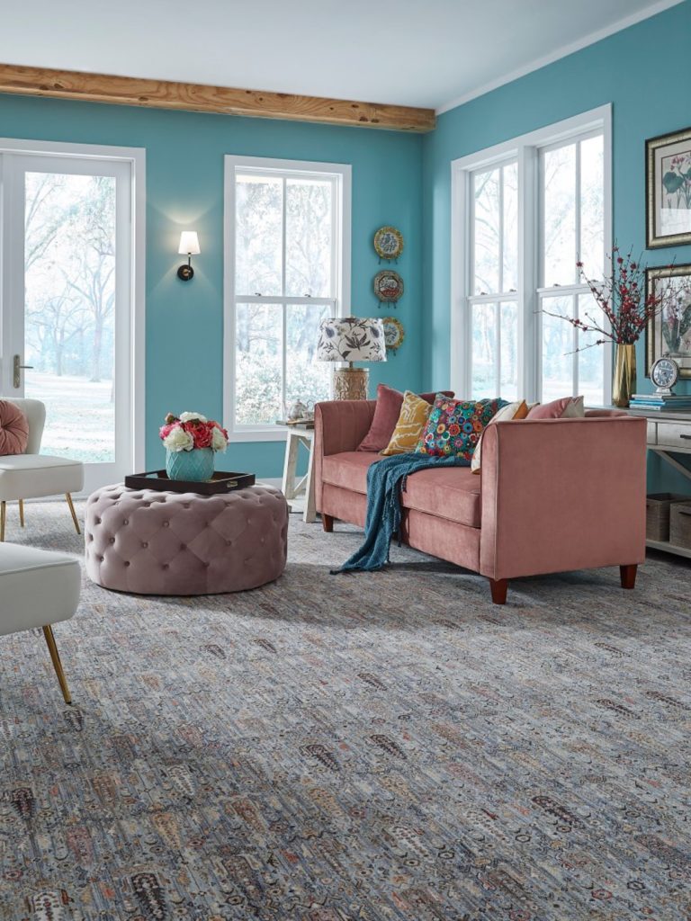A traditional oriental rug inspired carpet by Masland in a living room setting 