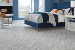 A blue and gray, diamond patterned carpet by Masland